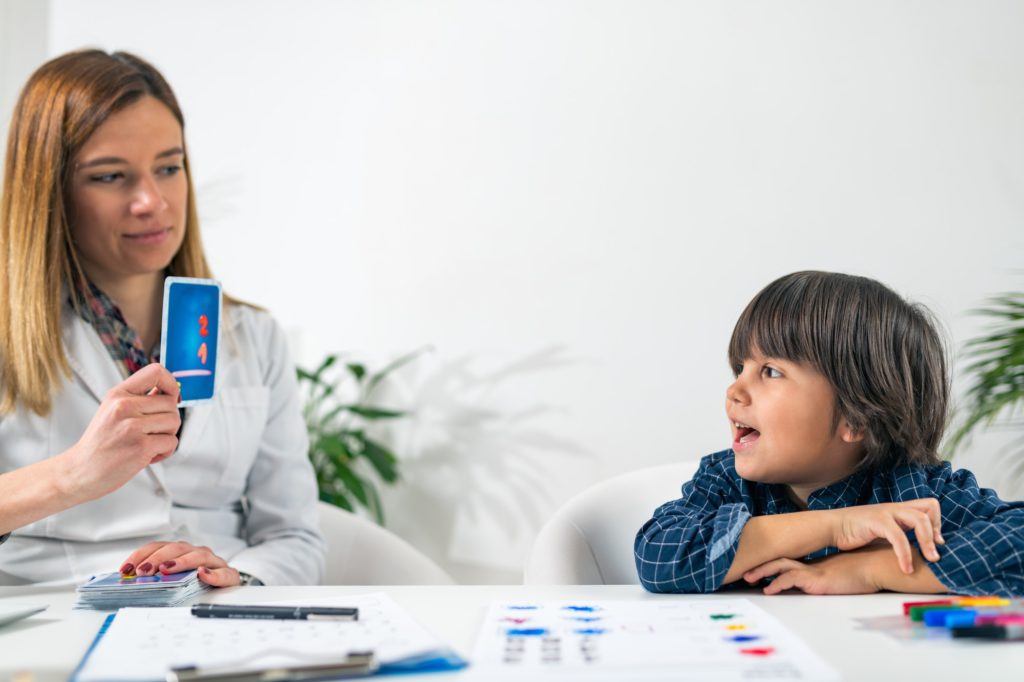 Mental Health Test for Children. Toddler Doing Logic Test with Cards